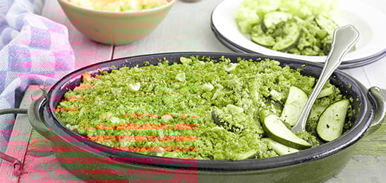 Recept van het Voedingscentrum: Courgette met een kruimellaagje en aardappelpuree