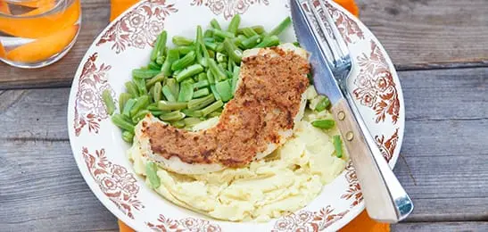 Recept van het Voedingscentrum: Vis met kruidenkorstje, snijbonen en aardappelpuree