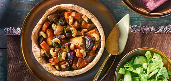 Recept van het Voedingscentrum: Naan taart met pompoen en paddenstoelen